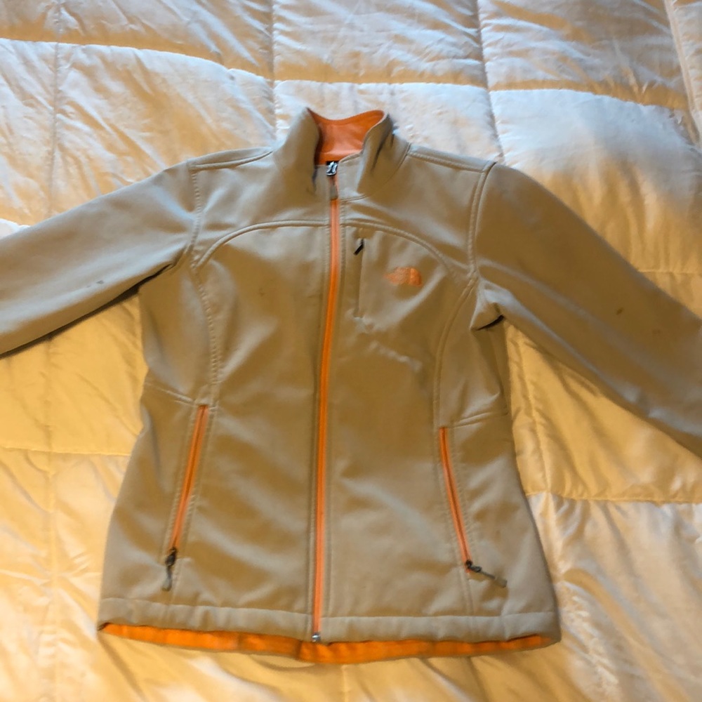 North face peach and tan coat